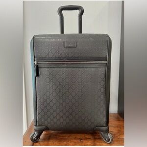 Authentic Gucci GG Black collectible monogram with Leather trim 21.5” Carry On